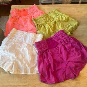 FP Movement by Free People Lot of four Shorts - Pink, White, Green, Orange.